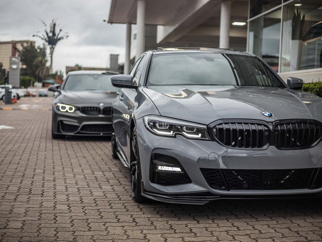 two grey BMW cars